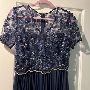 In perfect condition, My size is 6 but this dress fit me with size 2